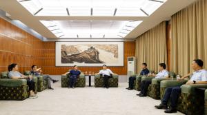 江苏新越集团与九游官方端网页版登录入口集团座谈交流